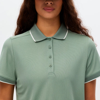 Röhnisch Miriam polo for women, featuring a stylish design in a soft fabric, displayed on a mannequin with a neutral background.