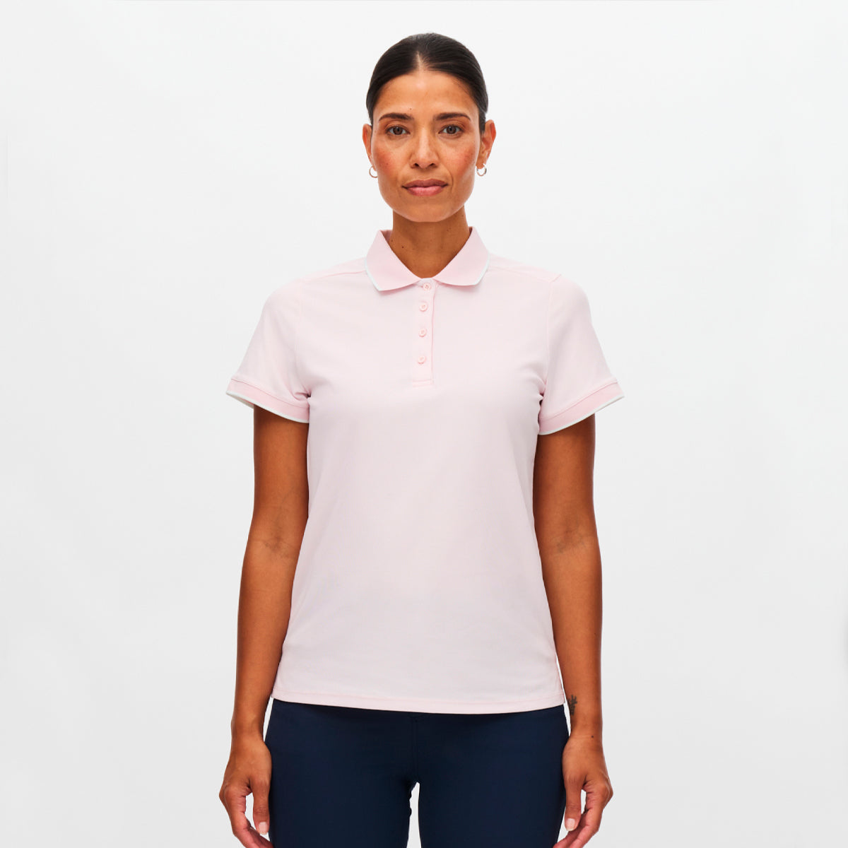 Röhnisch Miriam polo for women in a stylish design, featuring a classic collar and short sleeves.