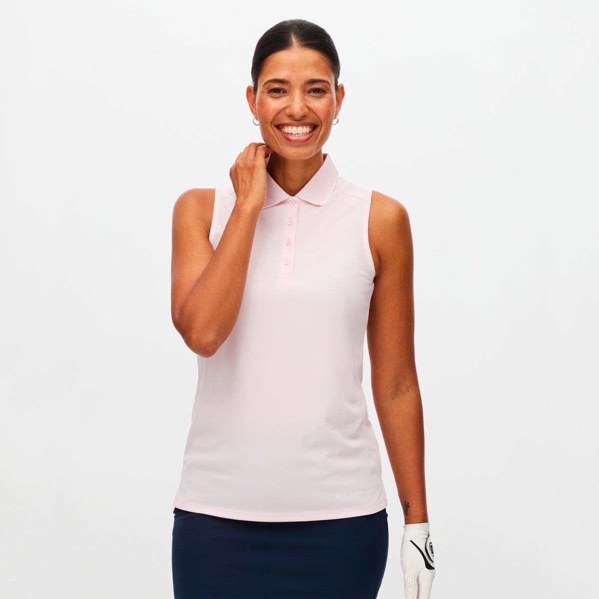 Röhnisch Miriam SL polo for women, featuring a stylish design and comfortable fit, displayed in a vibrant color.