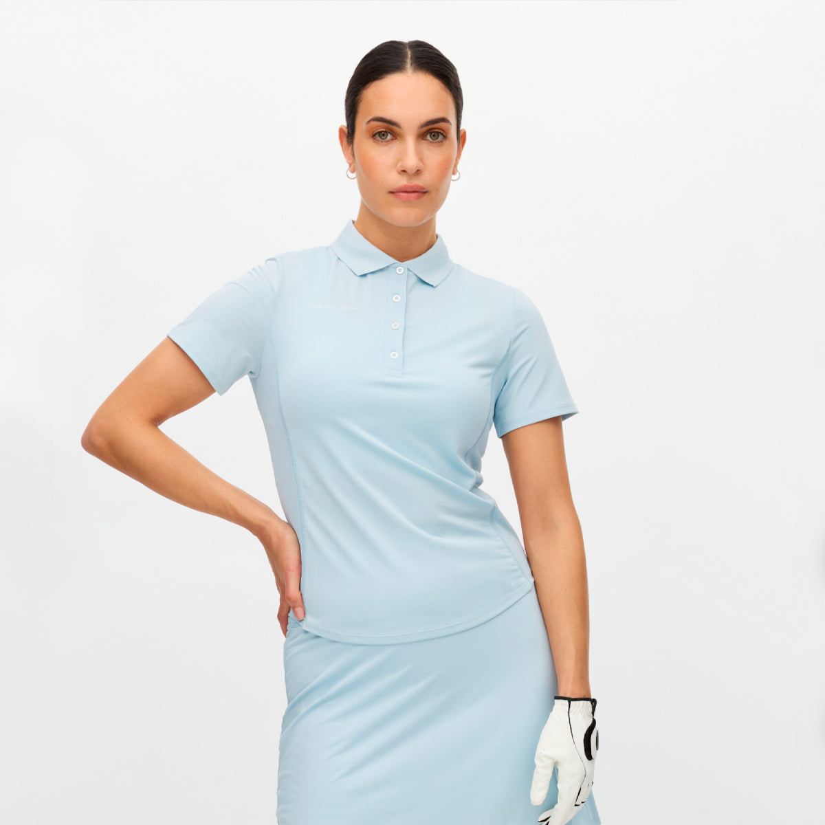 Röhnisch Nicky polo for women, featuring a stylish design and comfortable fit in a vibrant color.
