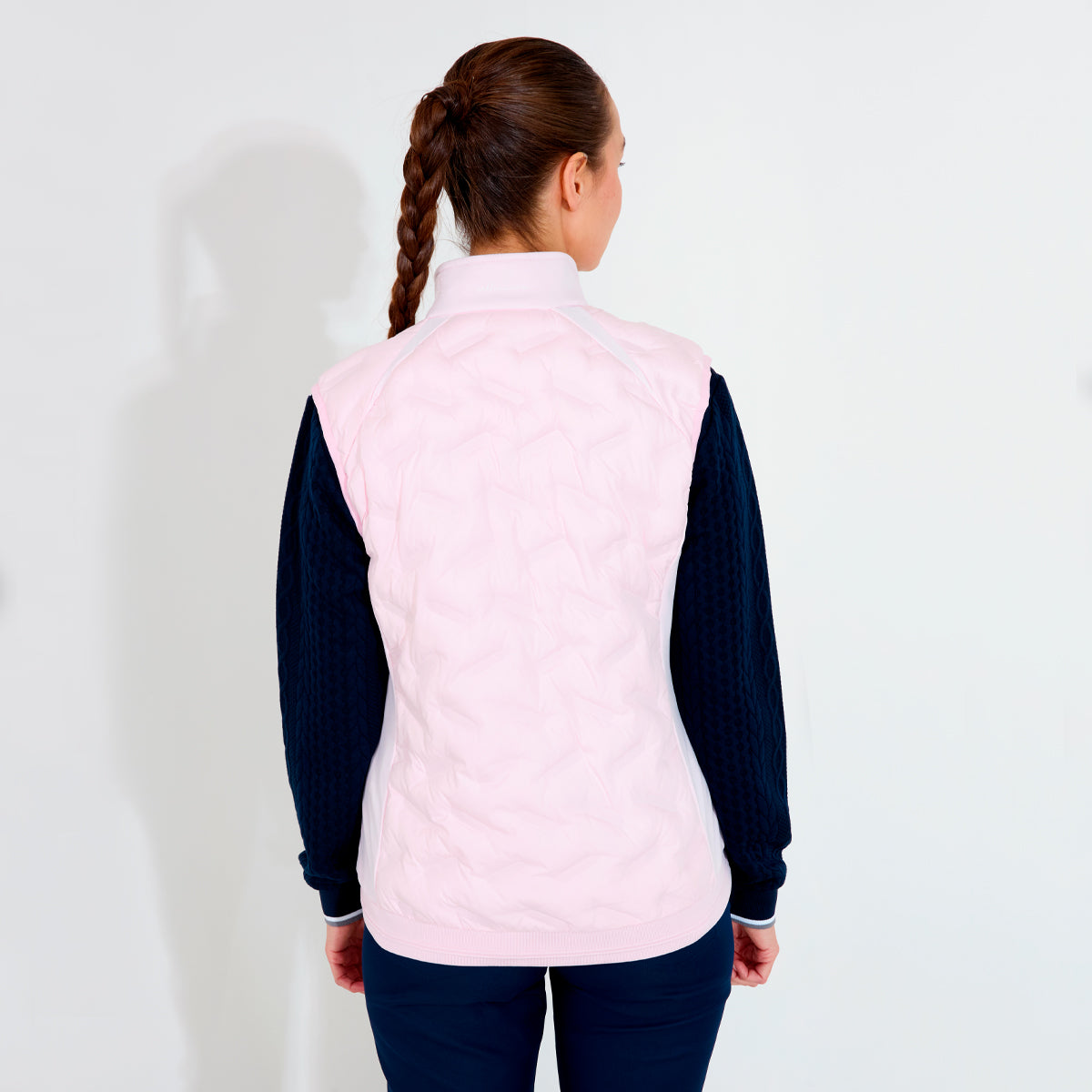 Abacus Portrush Hybrid vest for women, featuring a stylish design and lightweight insulation, perfect for outdoor activities.