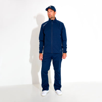 Abacus Pitch 37.5 navy regnbukser til herrer, vandtæt regntøj med justerbar talje og forstærkede sømme.