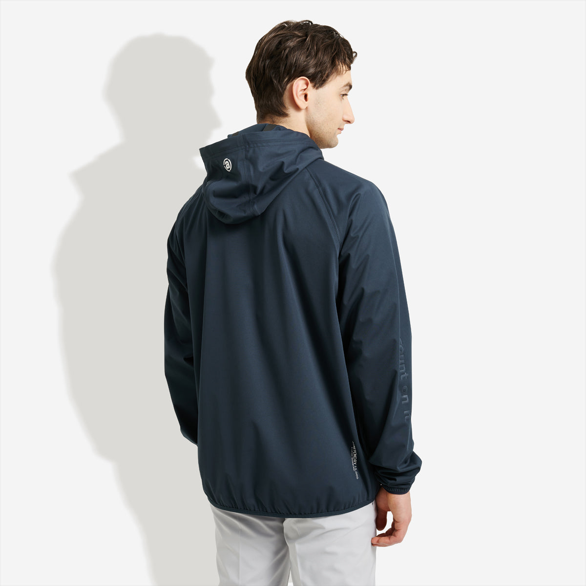 Abacus Bounce vandtæt herre-regntøj hoodie med hætte, blå farve, vandafvisende materiale og justerbar pasform.