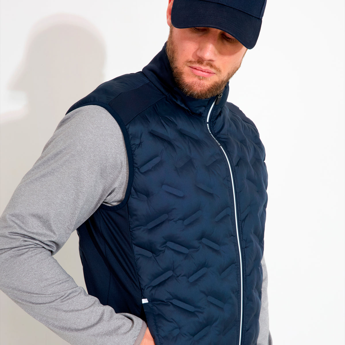 Abacus Portrush Hybrid vest for men, showcasing a sleek design with a mix of fabrics and a modern fit.